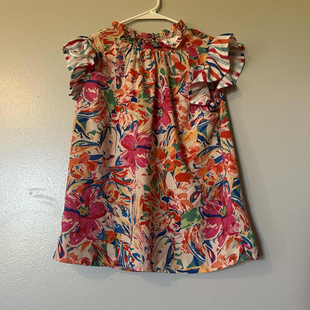 Simply Ella’gant Designs Floral Ruffle Sleeve Blouse